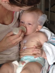 First bottle of pumped breast milk.